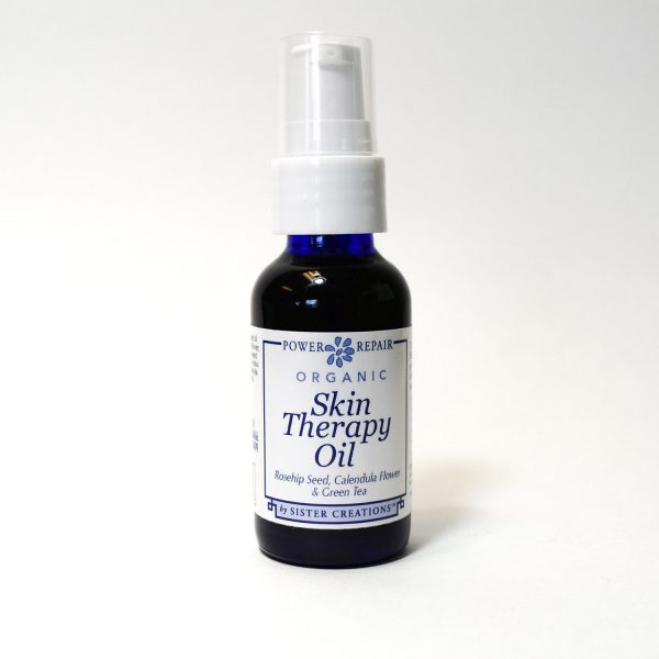 Power Repair Organic Skin Therapy Oil by Sister Creations in a vial with push-down spray top